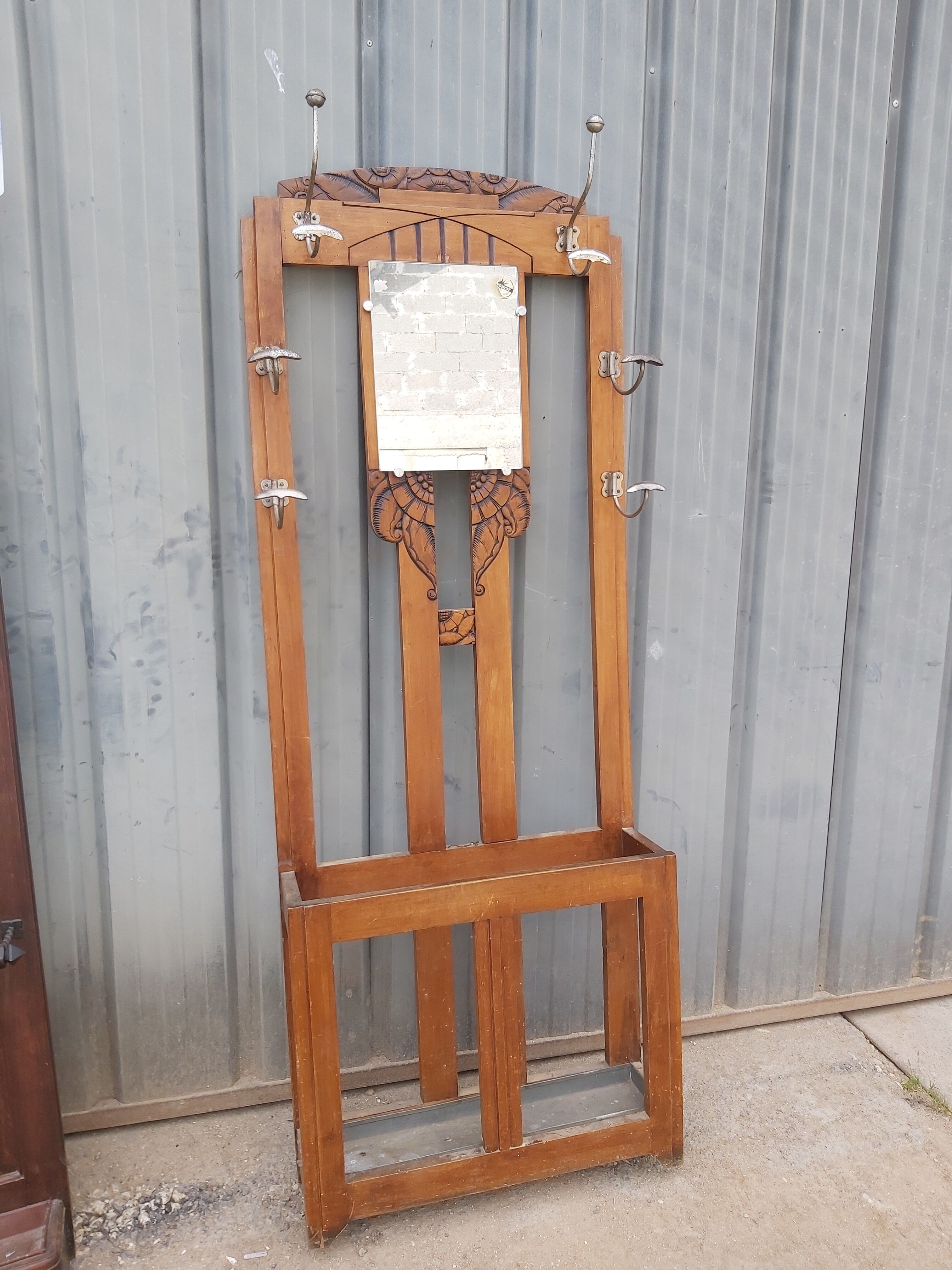 Vestiaire wears coat