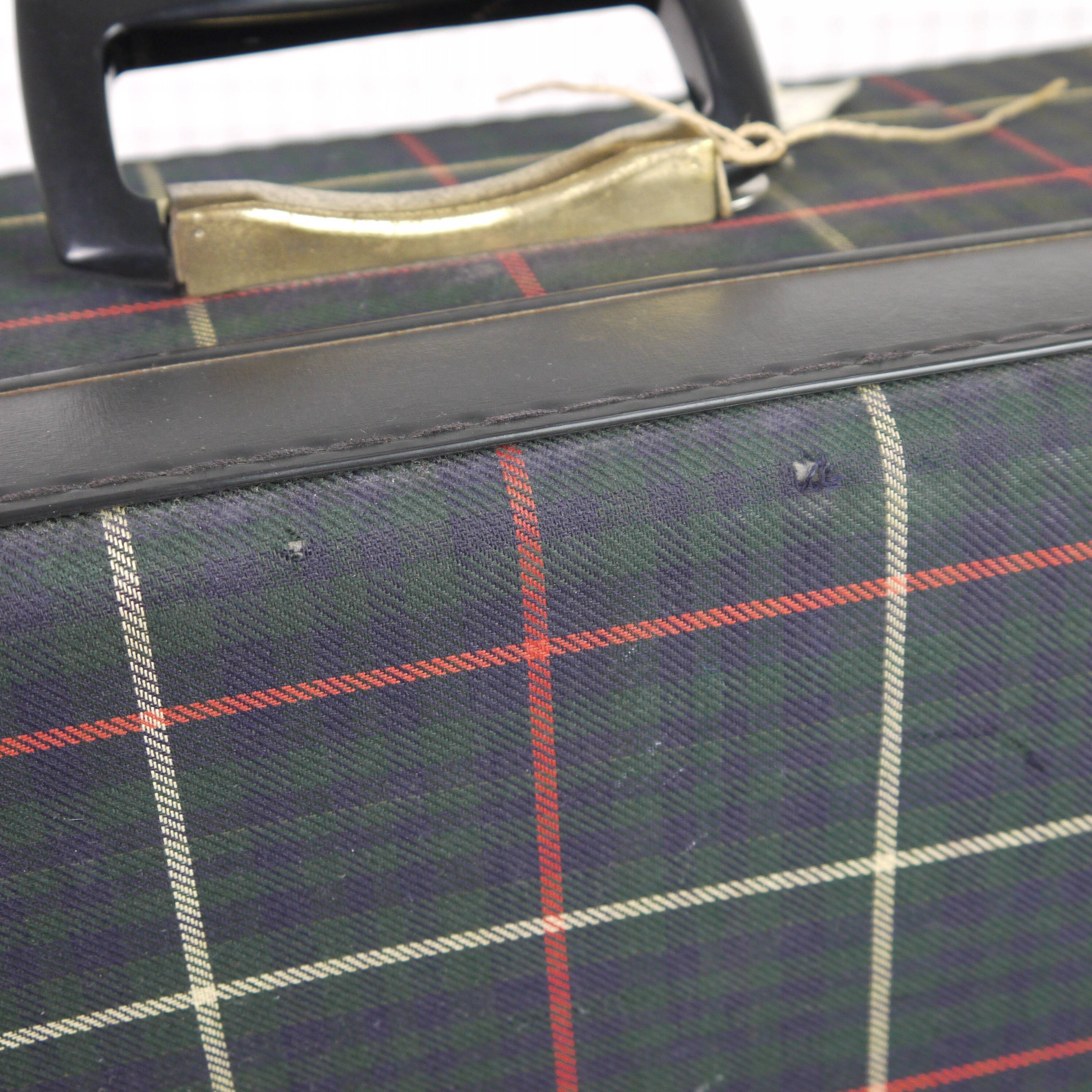 Green scottish fabric case with key