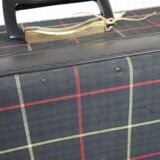 Green scottish fabric case with key