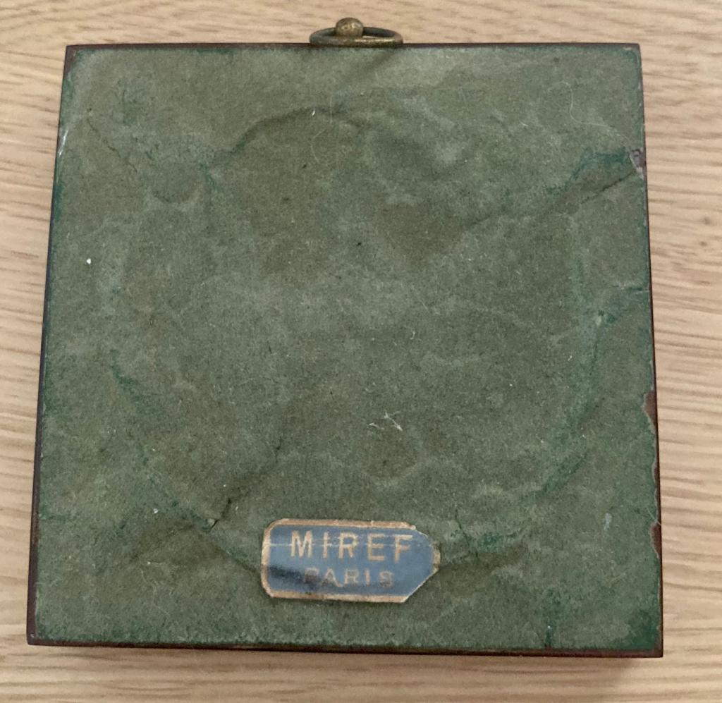 Porcelain and bakelite frame