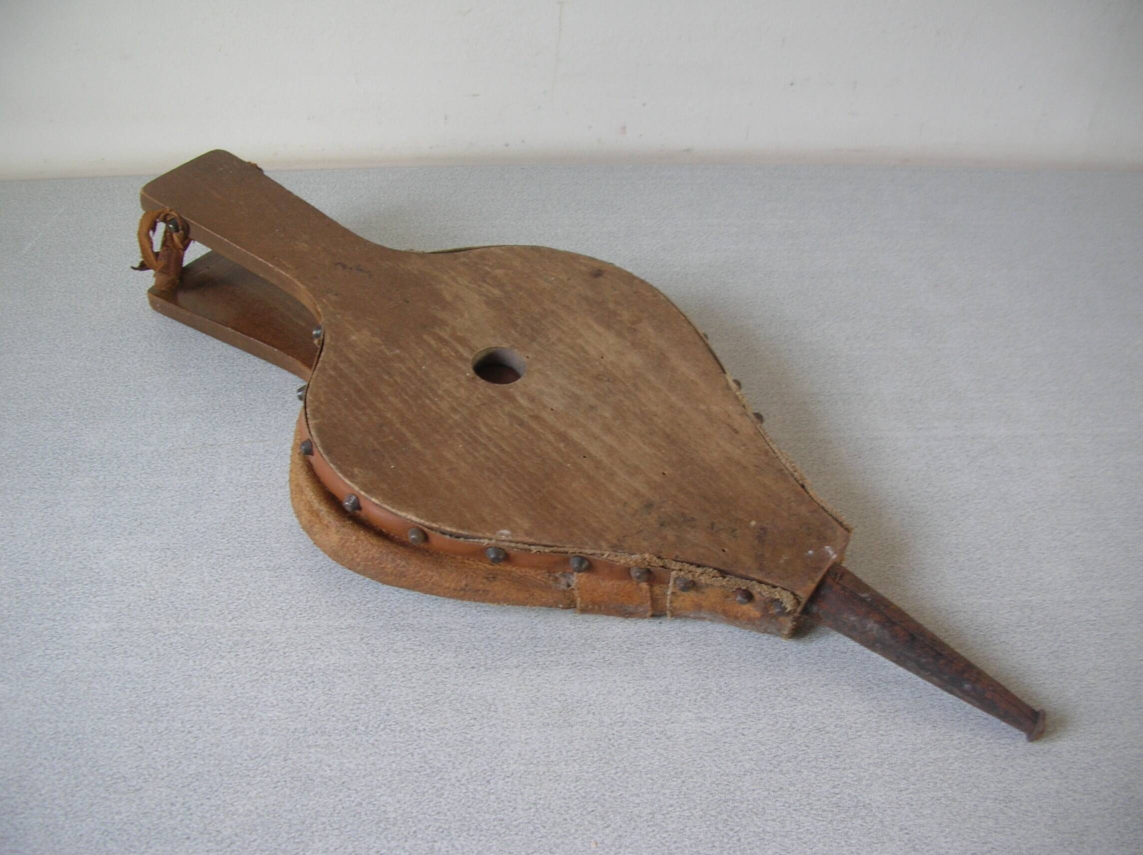 Old wooden and leather fireplace bellows works tool accessory