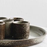 Shooters in pyrite glazed stoneware.