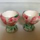 Pair of majolica egg cups