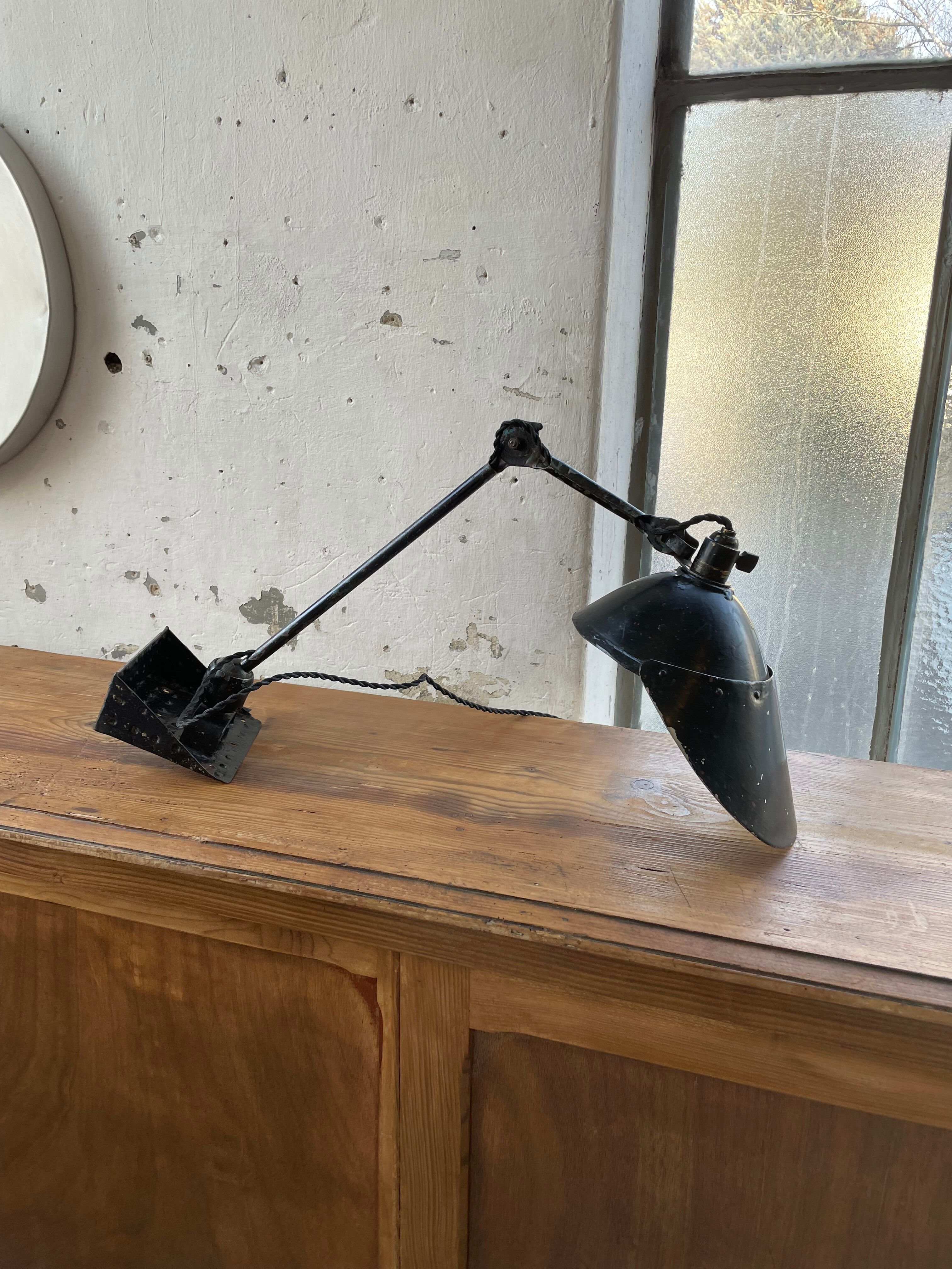 Articulated workshop lamp ravel ball joints