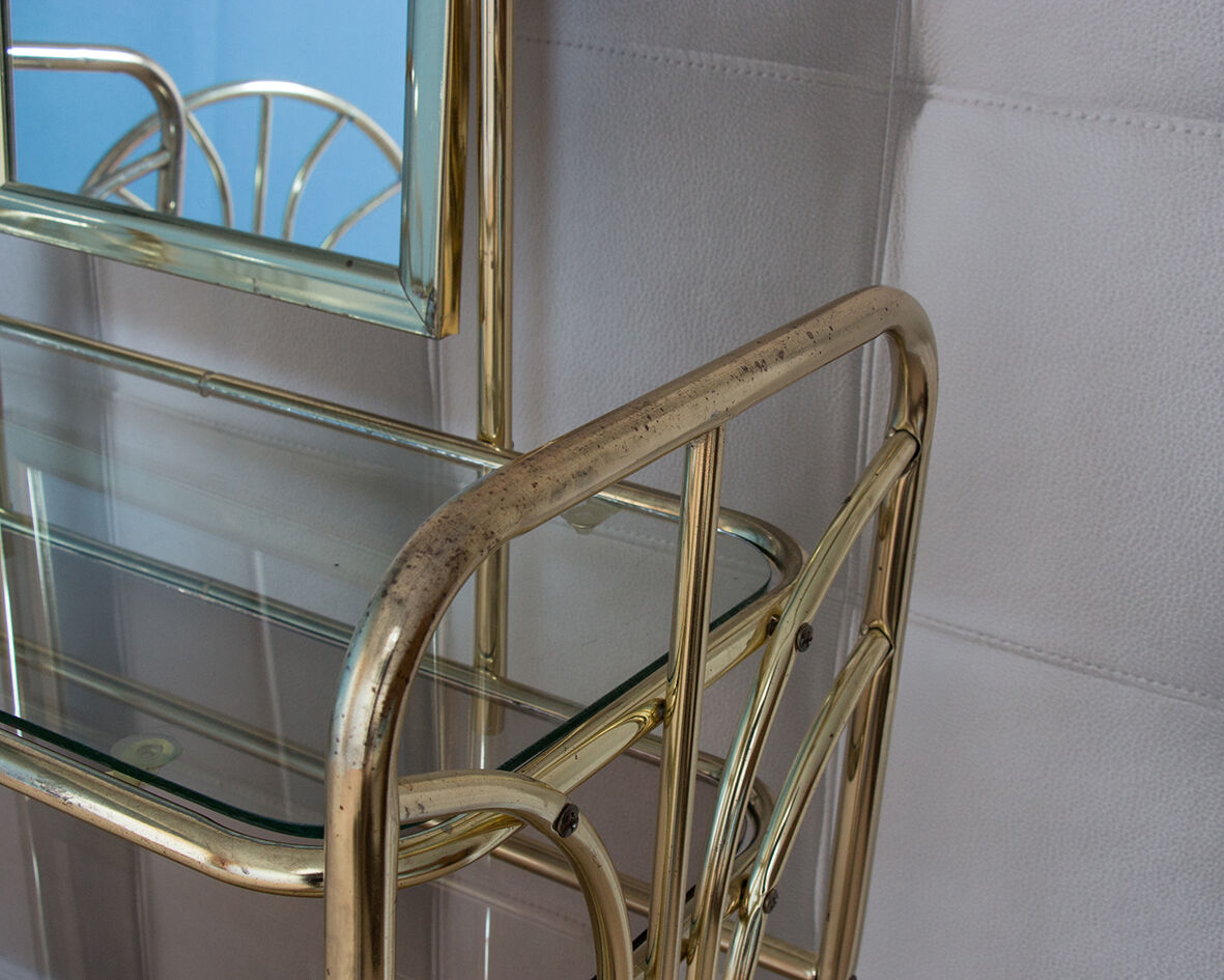 Dressing table in gold metal