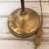Yellow brass and opaline lamp