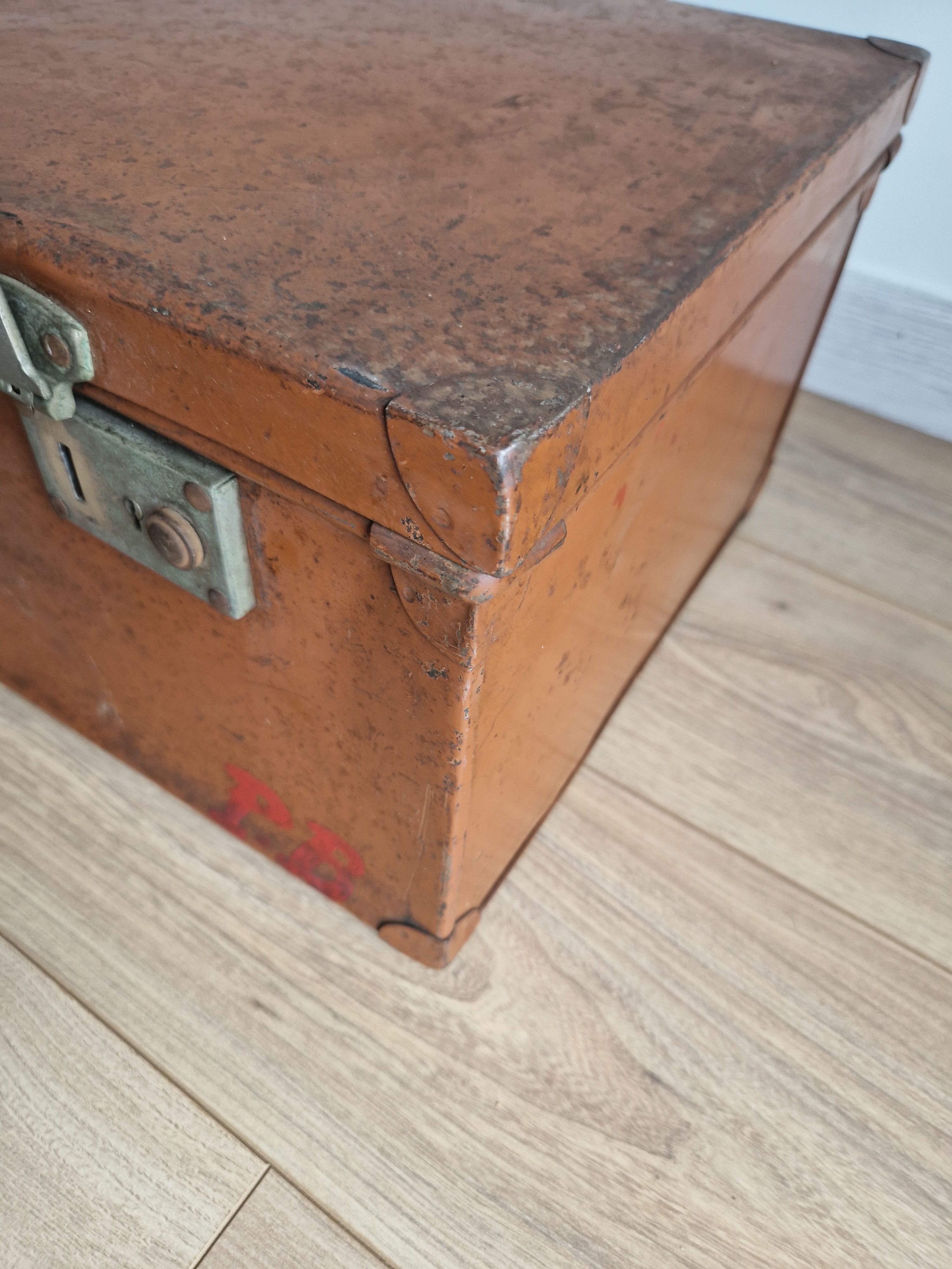 Old vintage military trunk orange metal