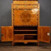 Secretary from the Louis XVI era in precious wood marquetry.