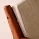Upholstered armchair with teak frame
