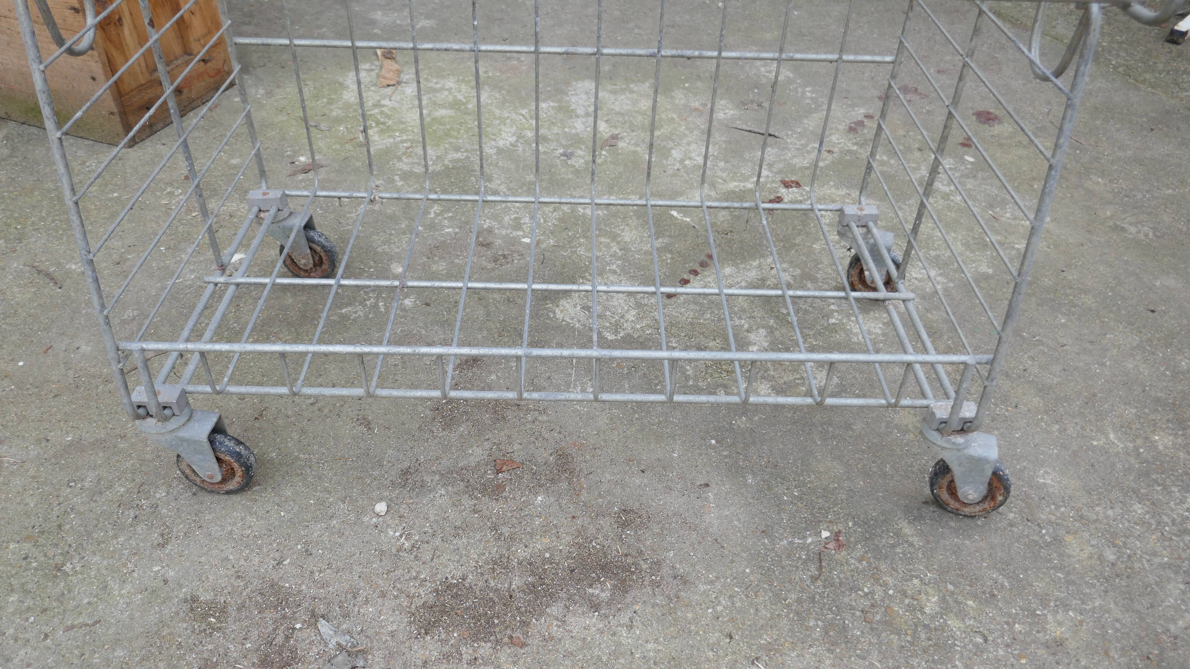 Rolling vintage store metal shelf