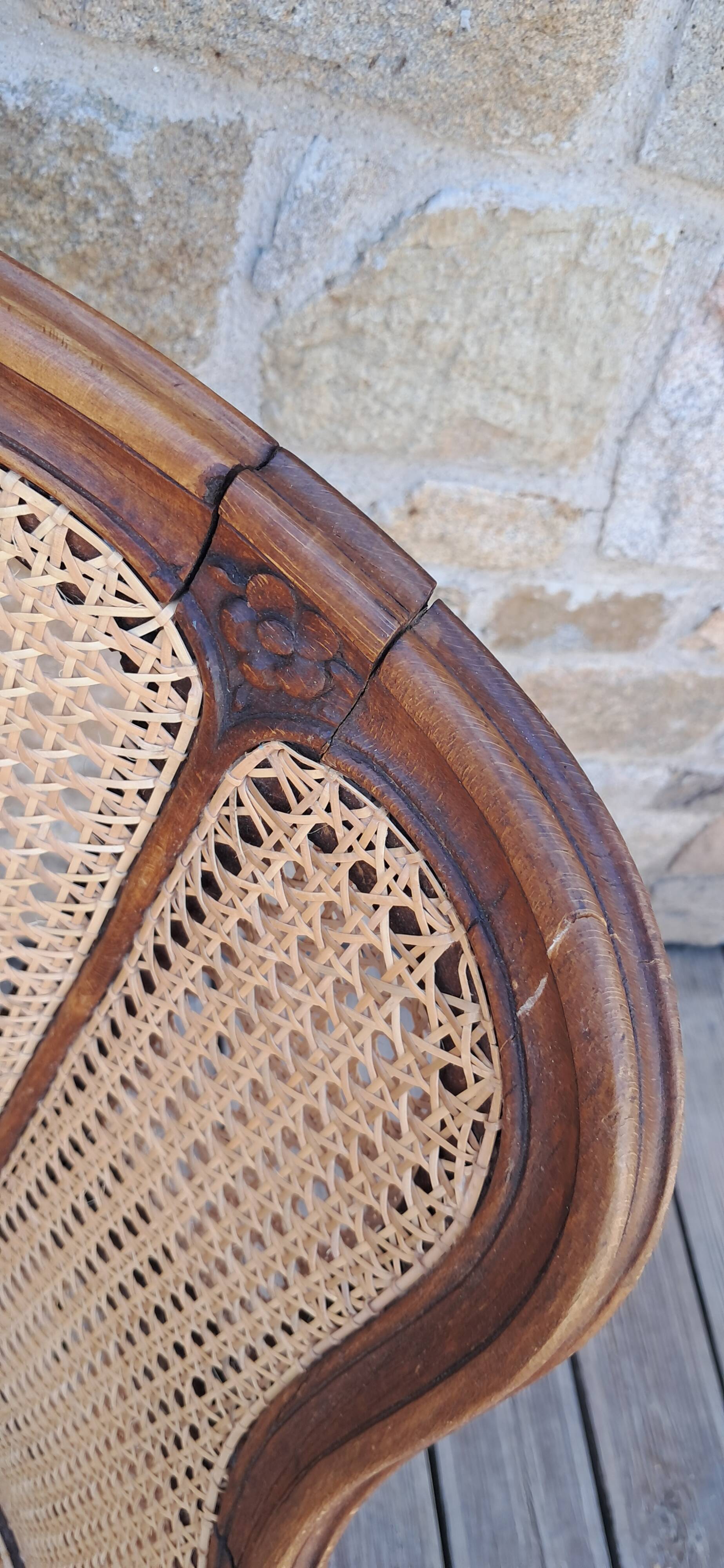 Caned armchair.