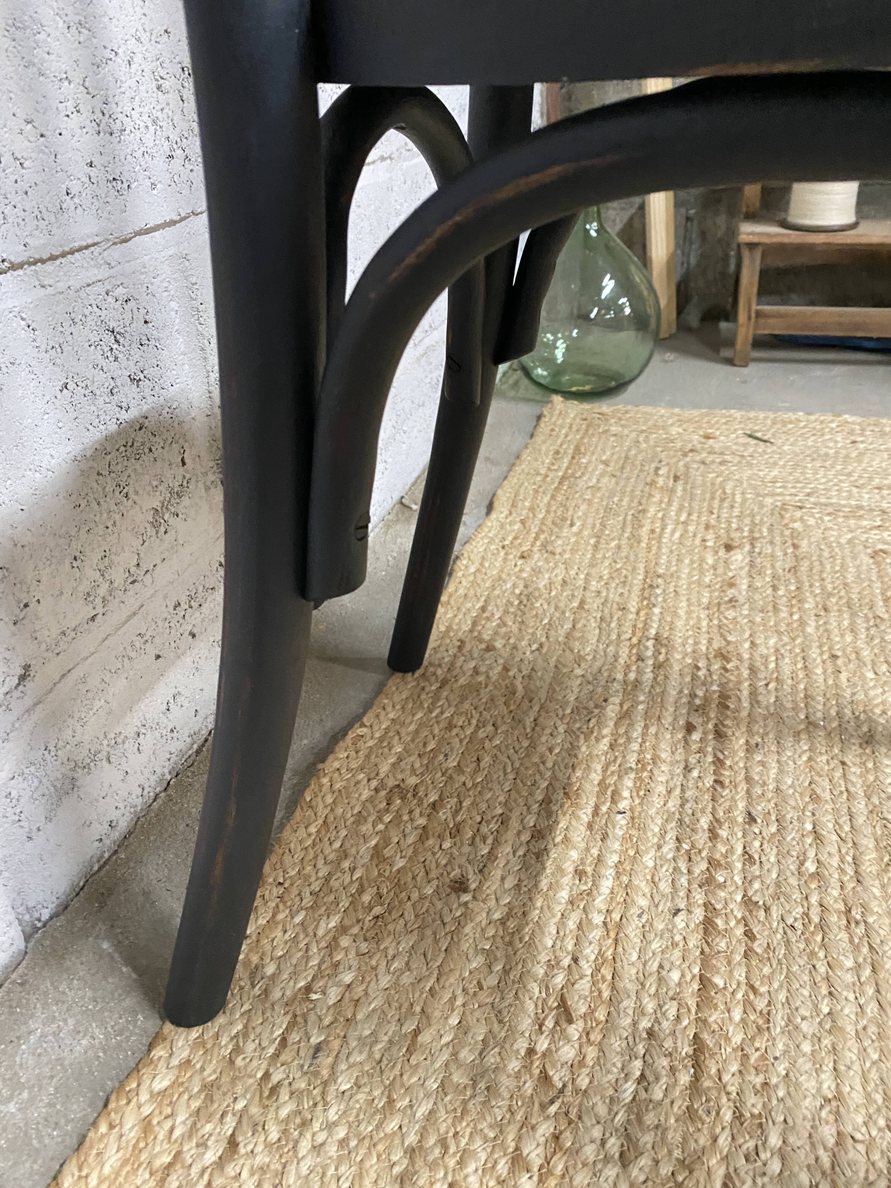 matte black bistro chair with a patina