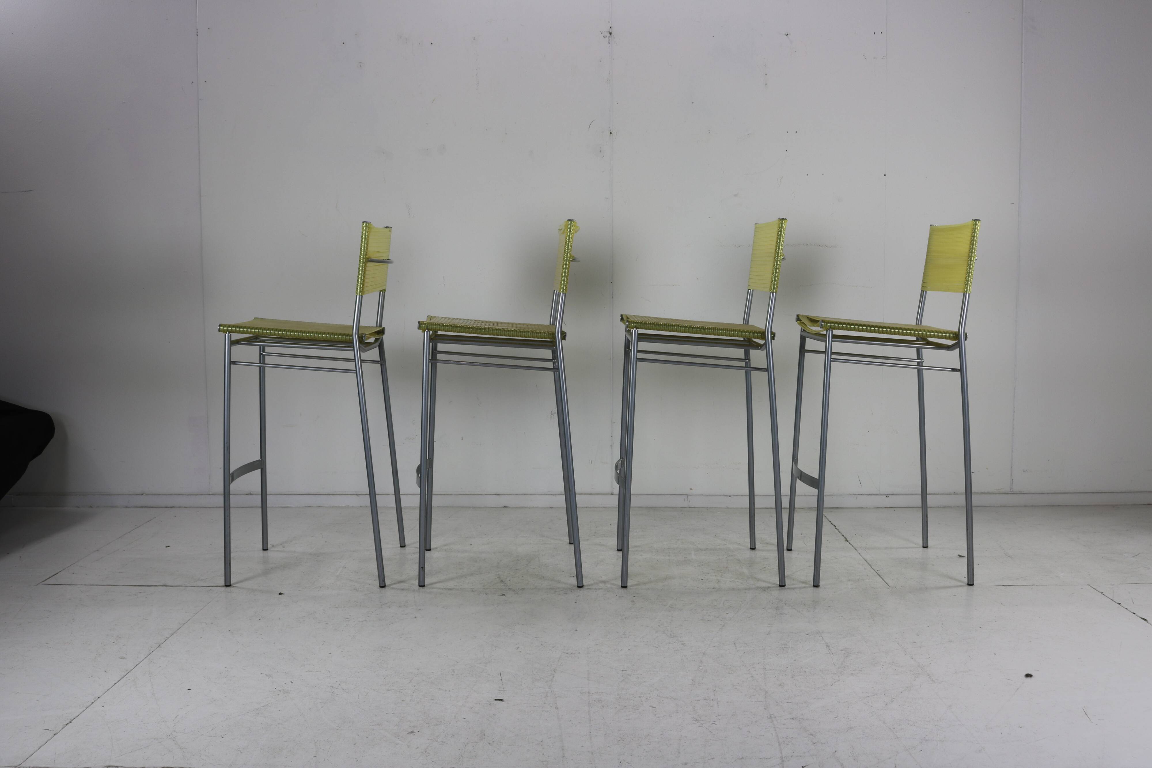 Set of four barstools by Tito Agnoli for Pierantonio Bonacina