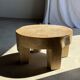 Coffee table, four-legged low table in natural solid monoxyle mango wood.