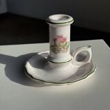 Small vintage hand-held candlestick in earthenware with green trim and floral decoration H10.5