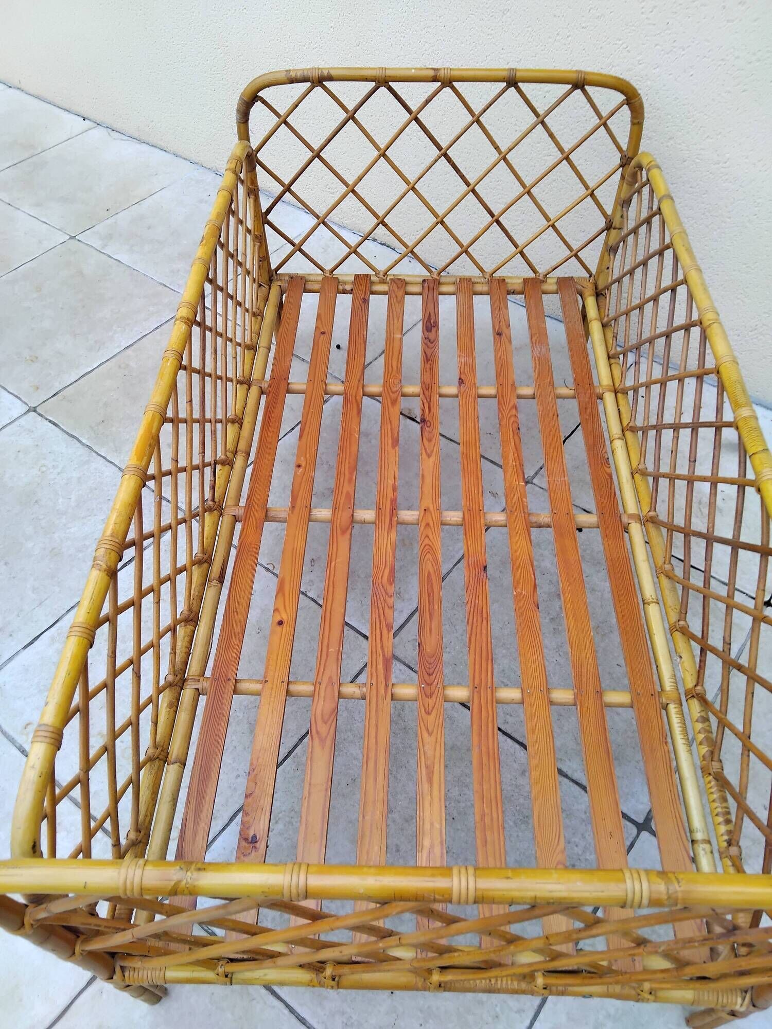 Vintage rattan child or baby bed