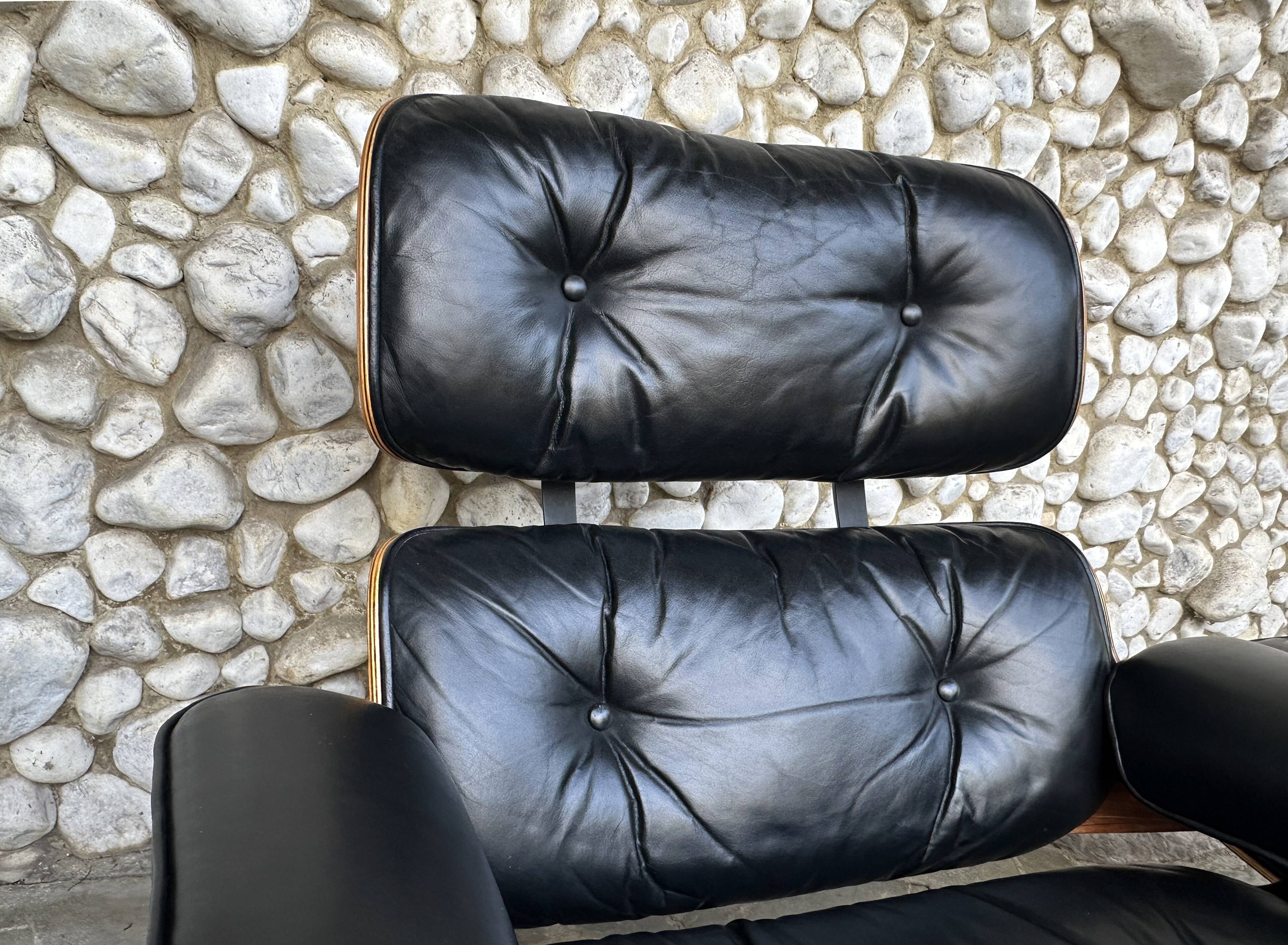Fauteuil Lounge et ottoman Herman Miller Charles & Ray Eames, palissandre