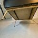 2 vintage faux leather armchairs