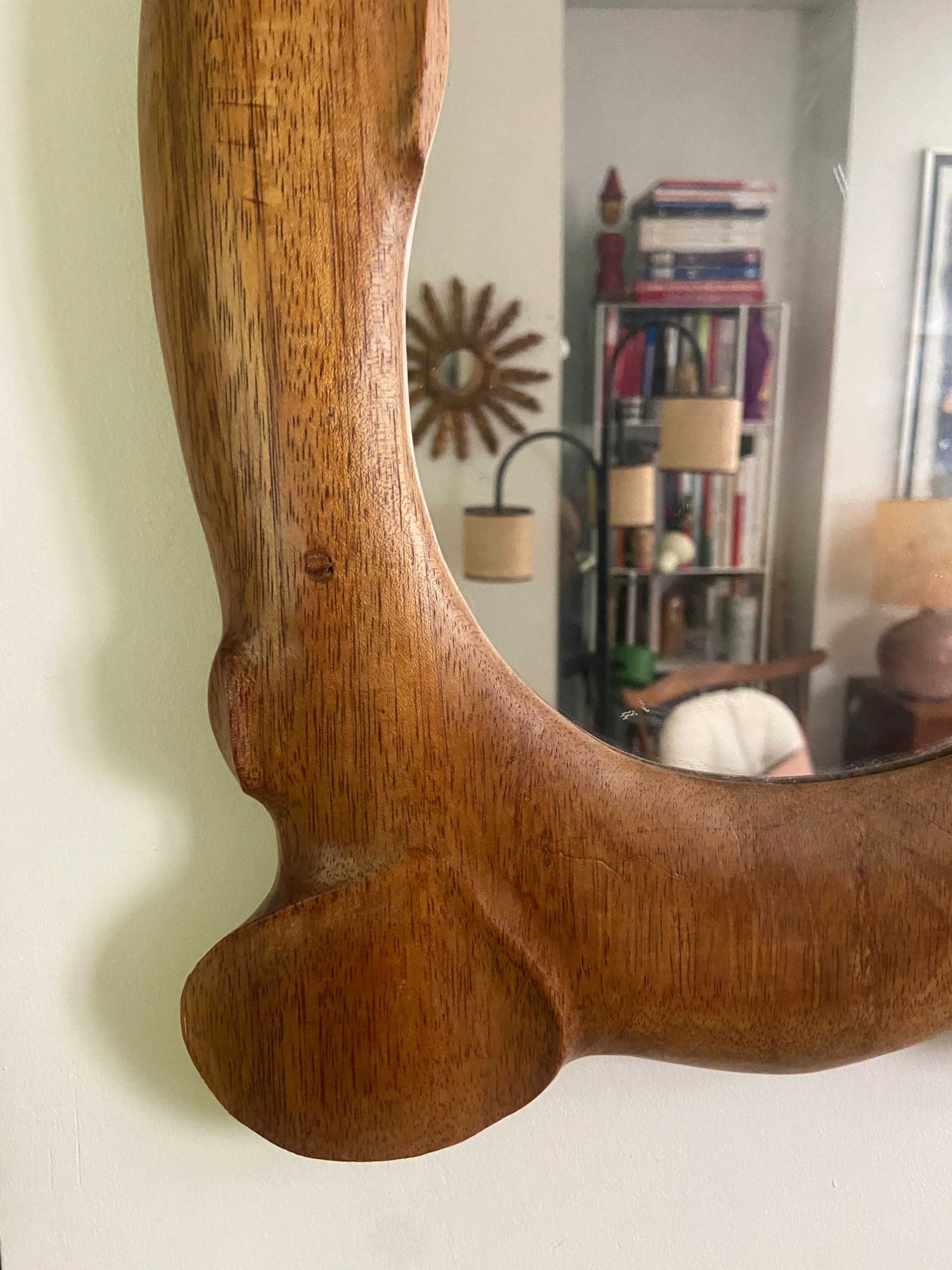 Polymorphic mirror in vintage wood