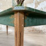 Vintage farm table with spindle legs.