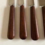 Set de 9 couteaux à manche de bois de palissandre mid century