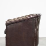 dark cowhide club chair in English style