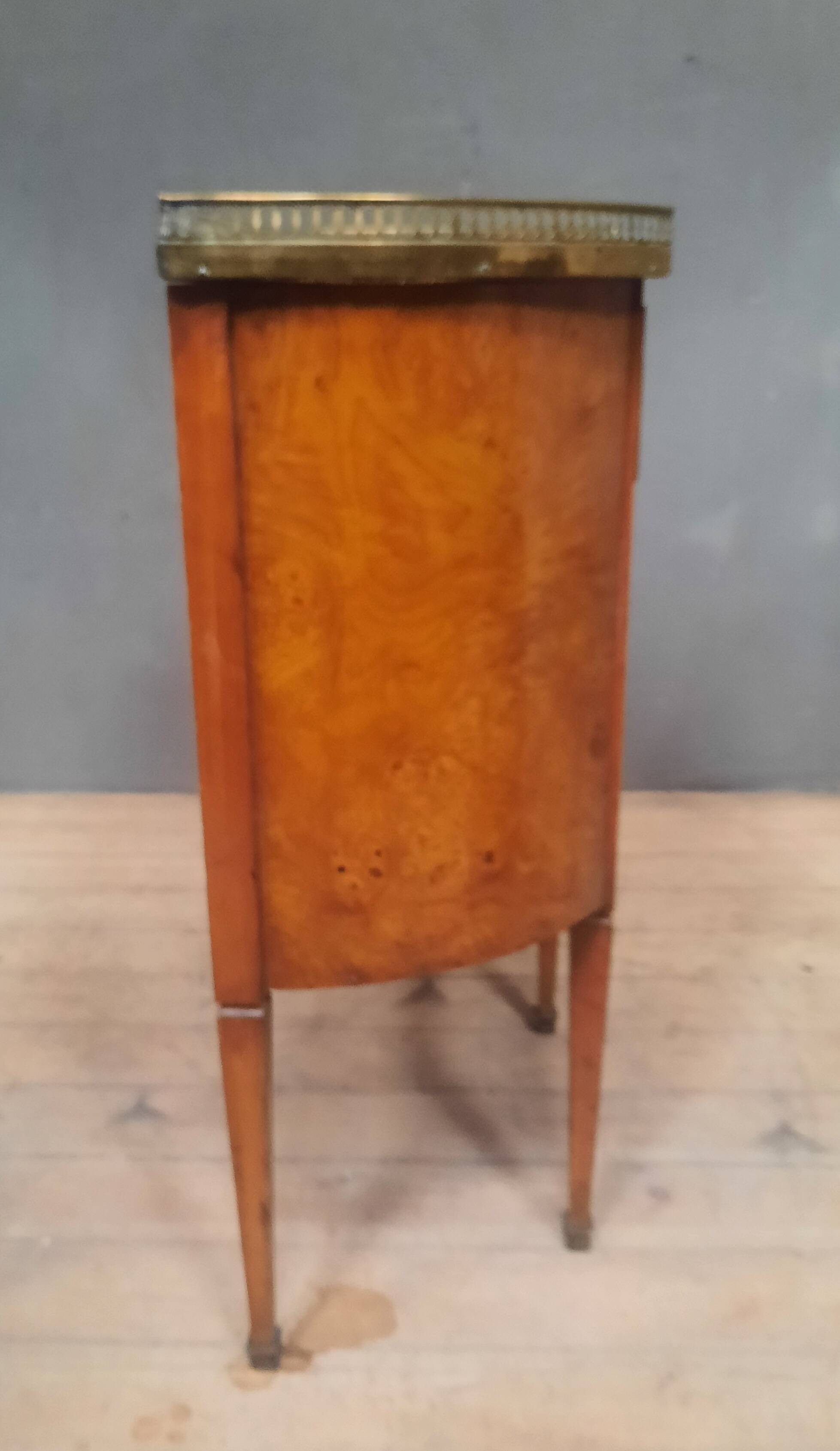 Small Louis XVI style chest of drawers with rounded sides