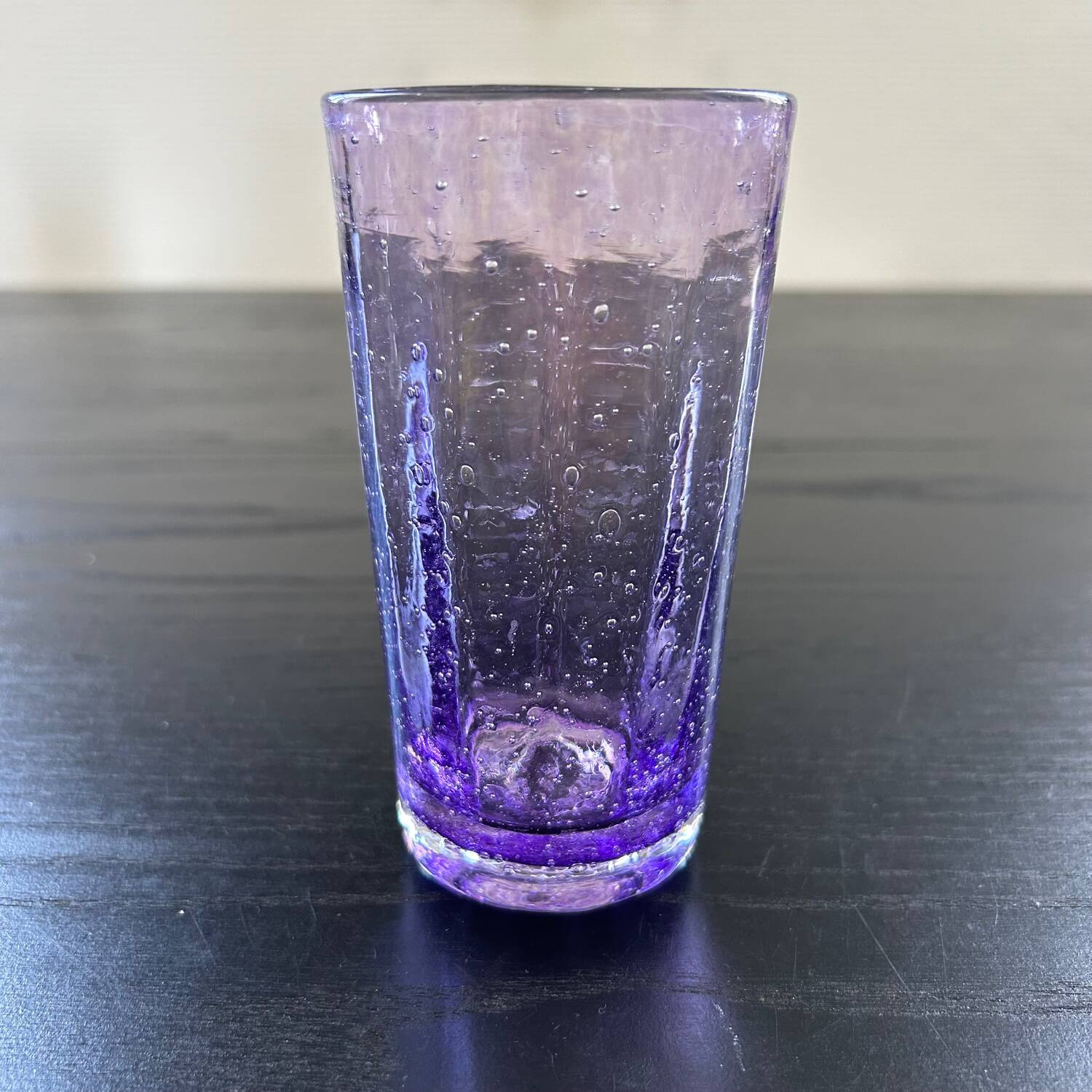 Biot glass in purple glass