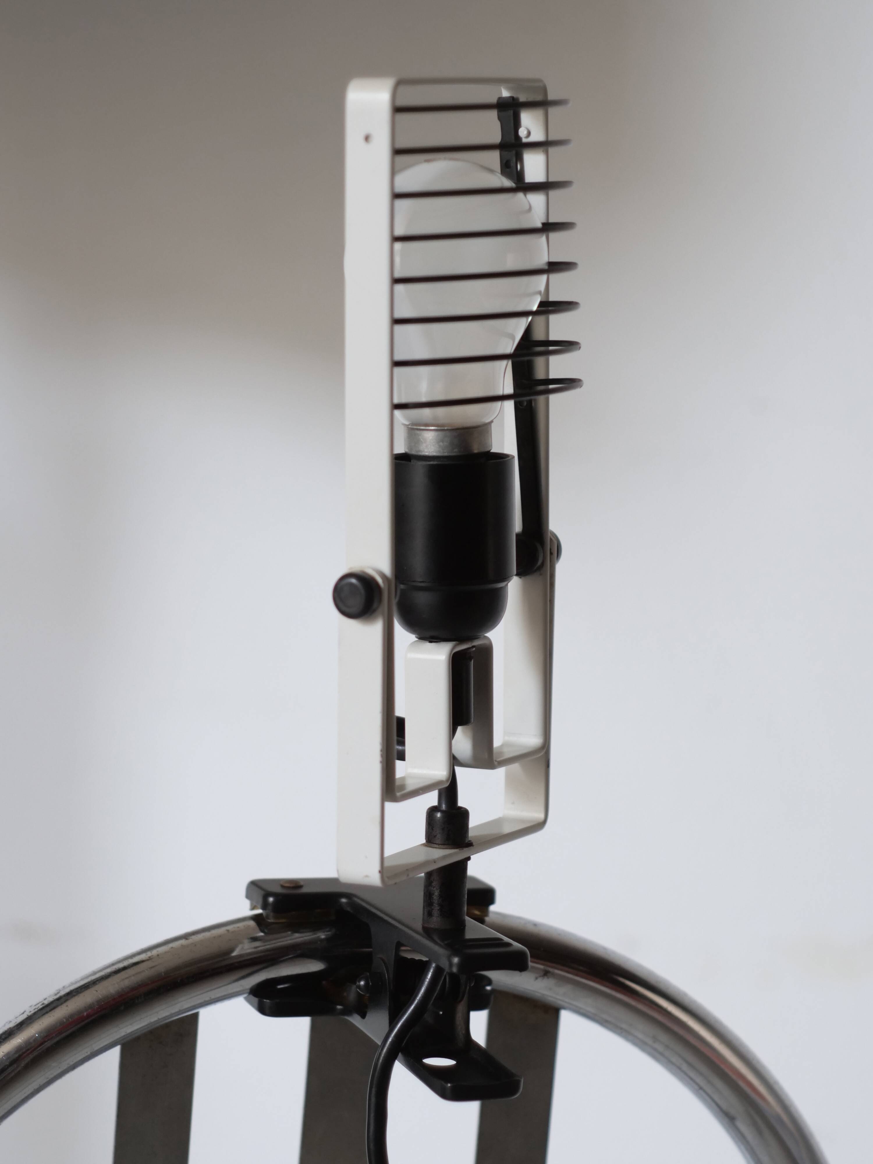 Artemide clamp lamp designed by Ernesto Gismondi model Sintesi