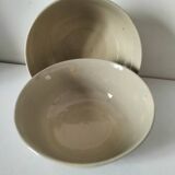Two large vintage bowls in pastel decor on mini pedestals.