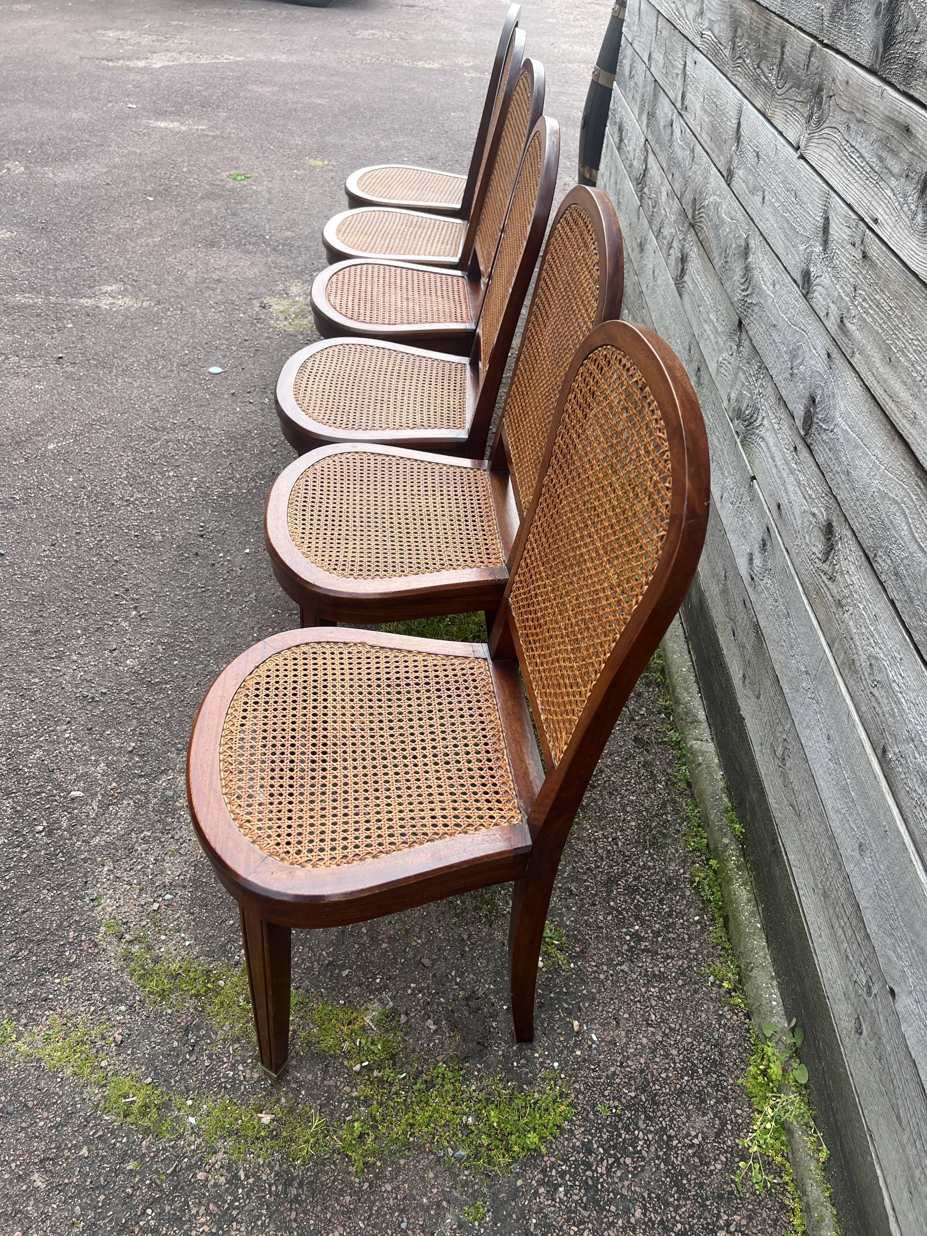 Six caned mahogany chairs, Art Deco, 20th century.