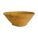 Old large bread basket of baker in braided wicker