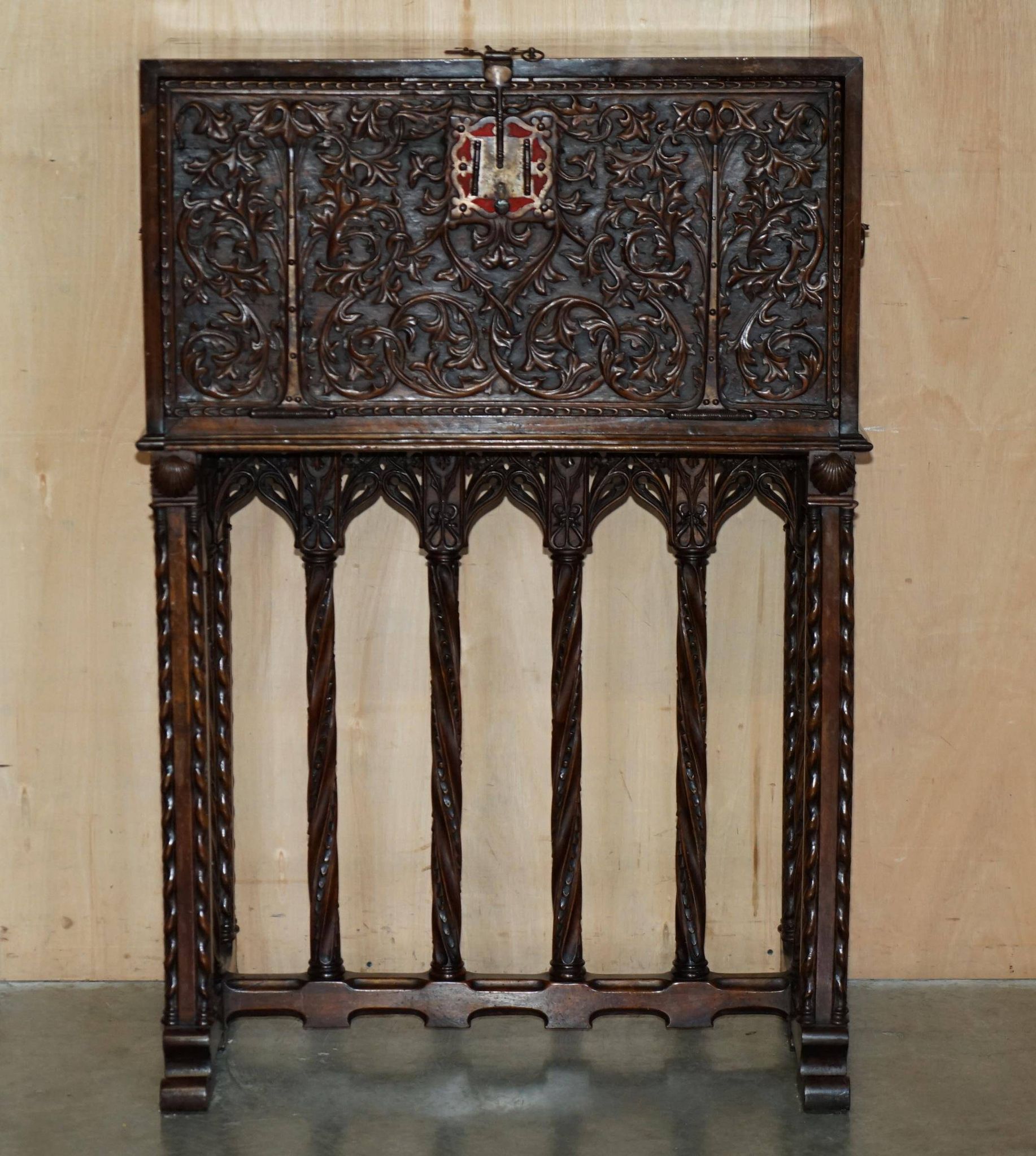 18th-century carved Spanish cabinet with hidden storage.