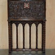 18th-century carved Spanish cabinet with hidden storage.