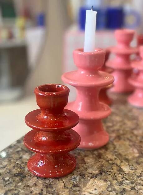 Red candlestick holder