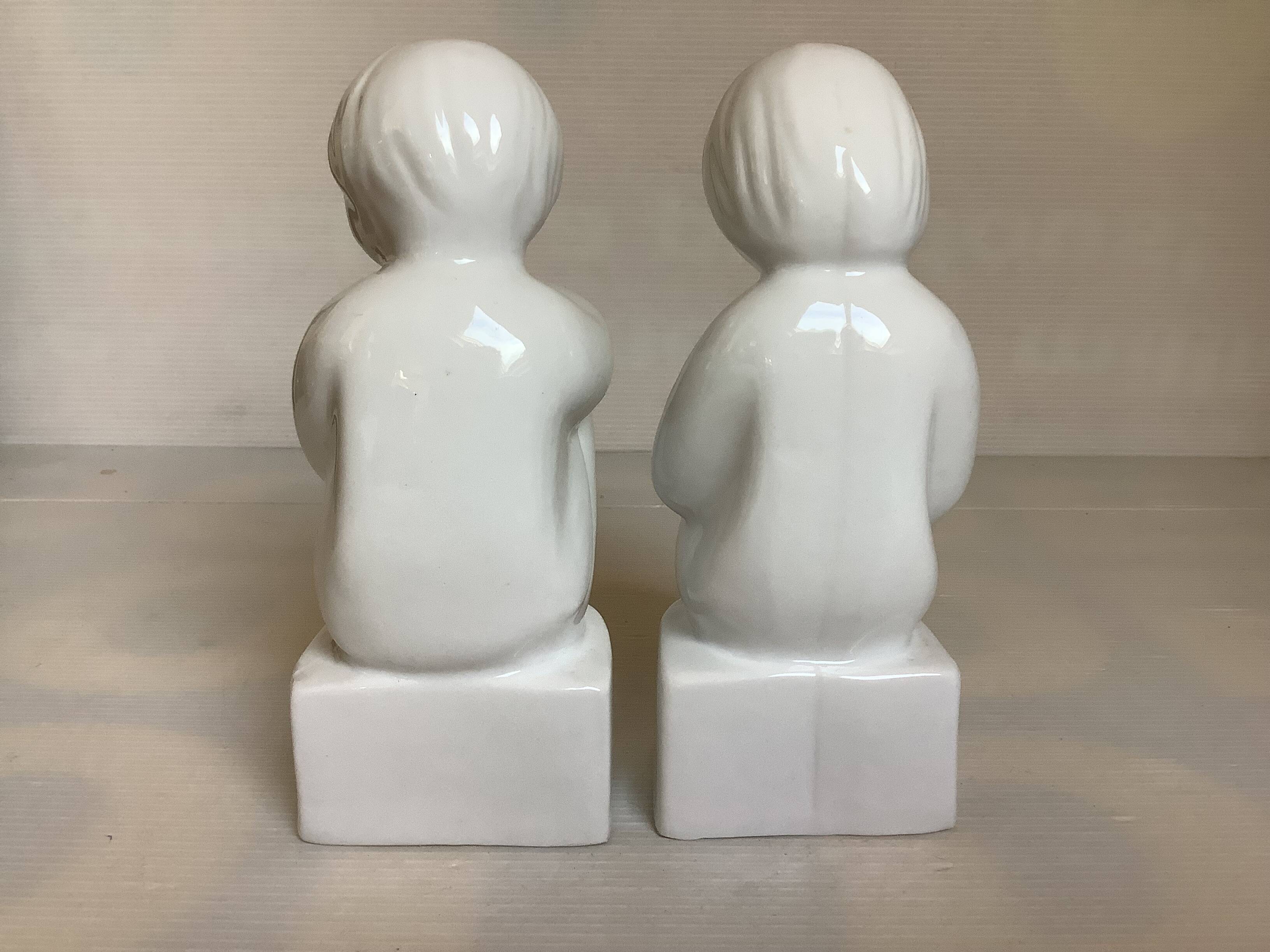 Pair of bookends featuring children reading from the 1970s.