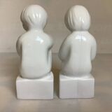 Pair of bookends featuring children reading from the 1970s.