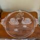 Glass plate decorated with swans