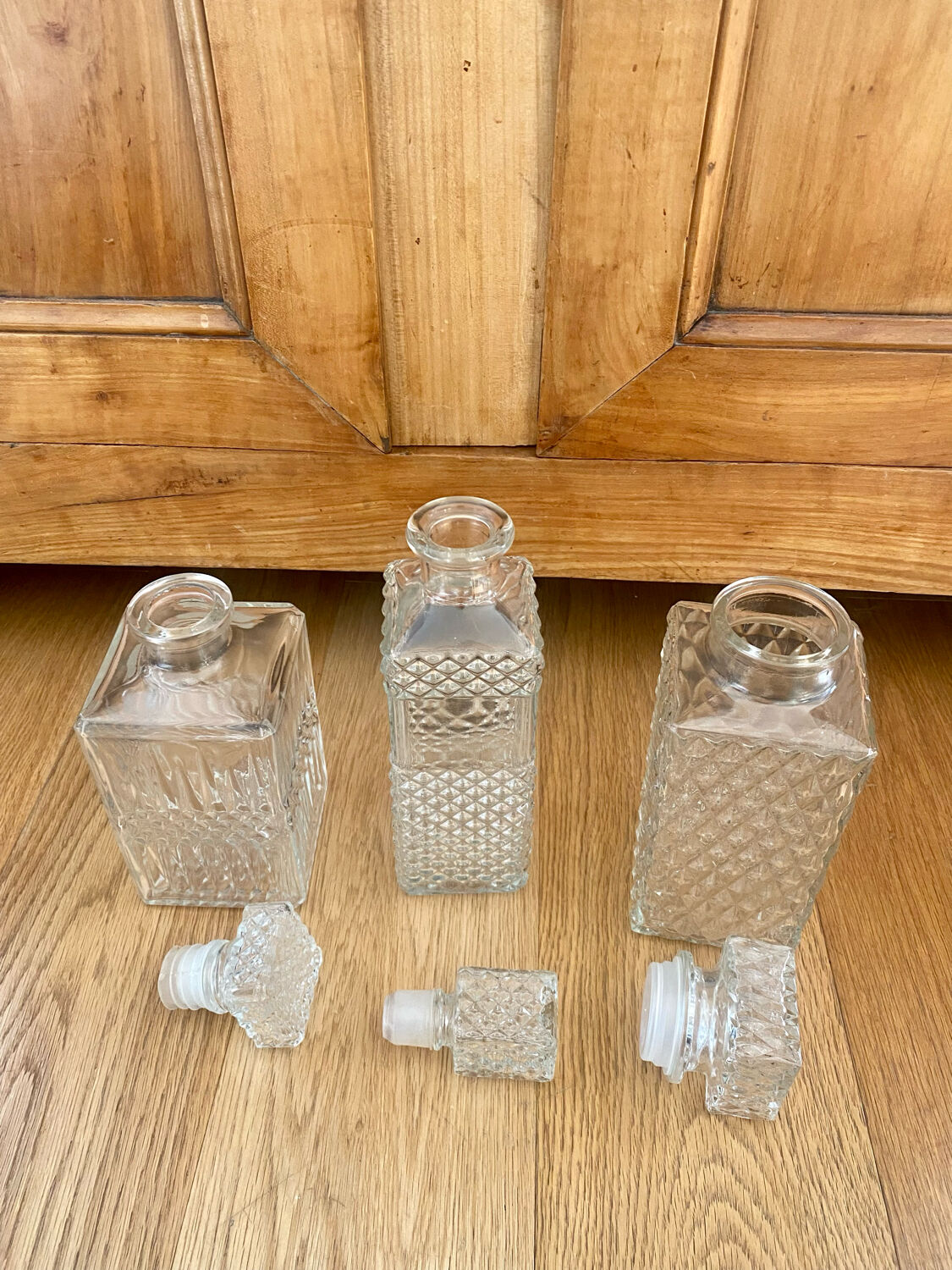 Set of 3 vintage whisky carafe bottles in molded glass