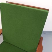 Pair of vintage Scandinavian armchairs in teak and green fabric from the 1960s.