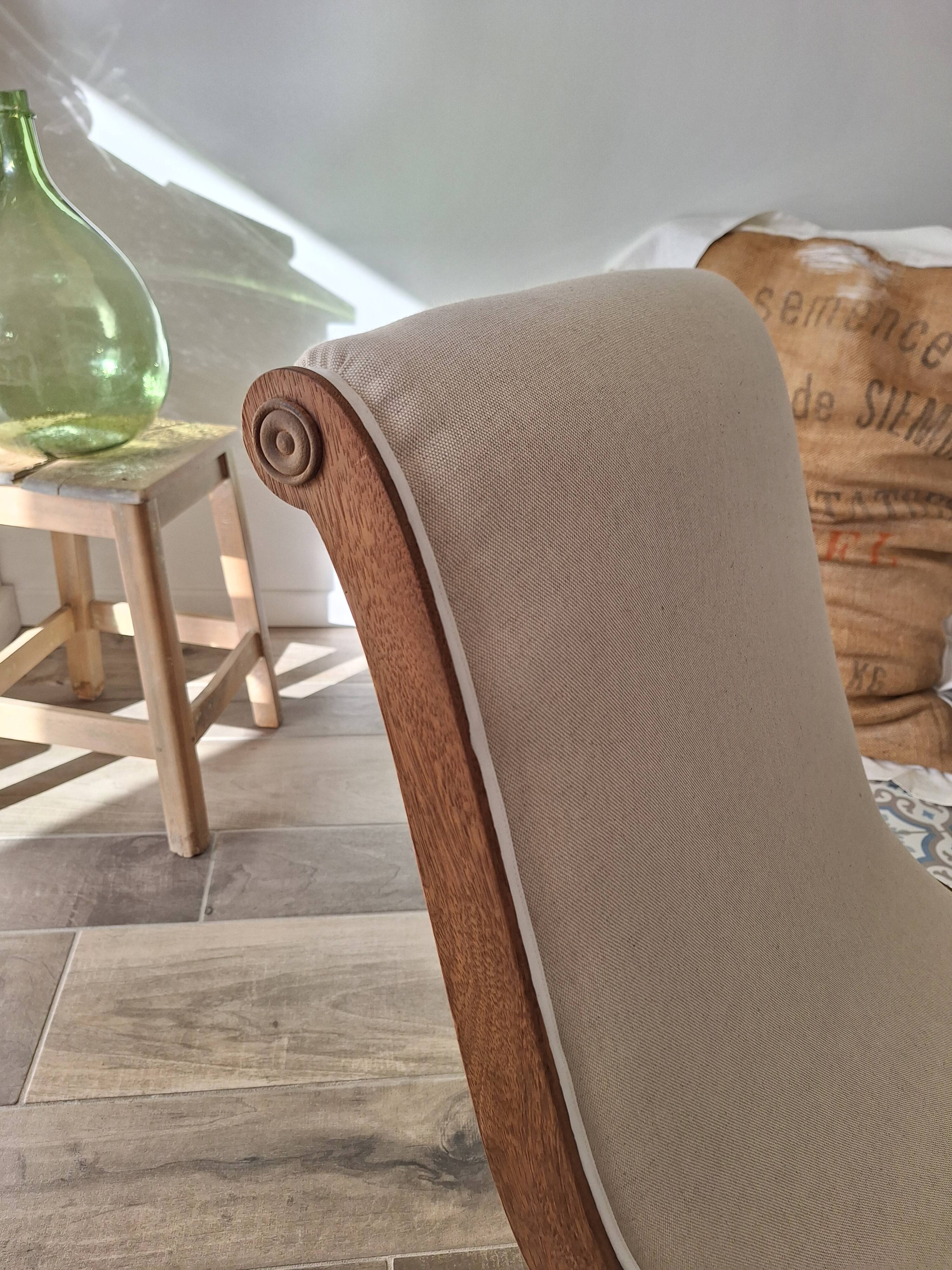 Vintage gondola armchair in beige linen fabric.