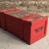 Red wooden trunk with floral patterns
