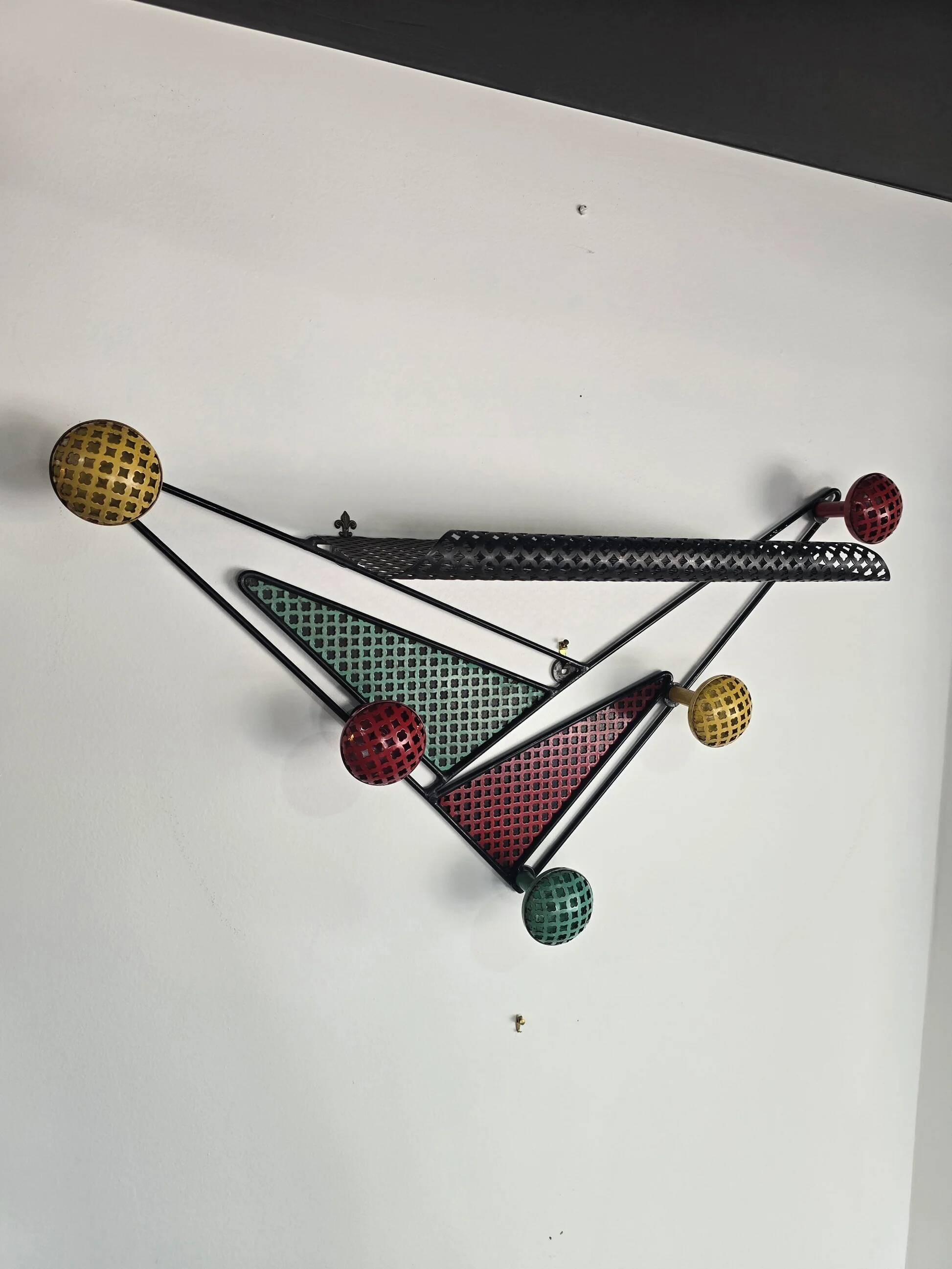Wall-mounted coat rack attributed to Mathieu Matégot – France, 1950s