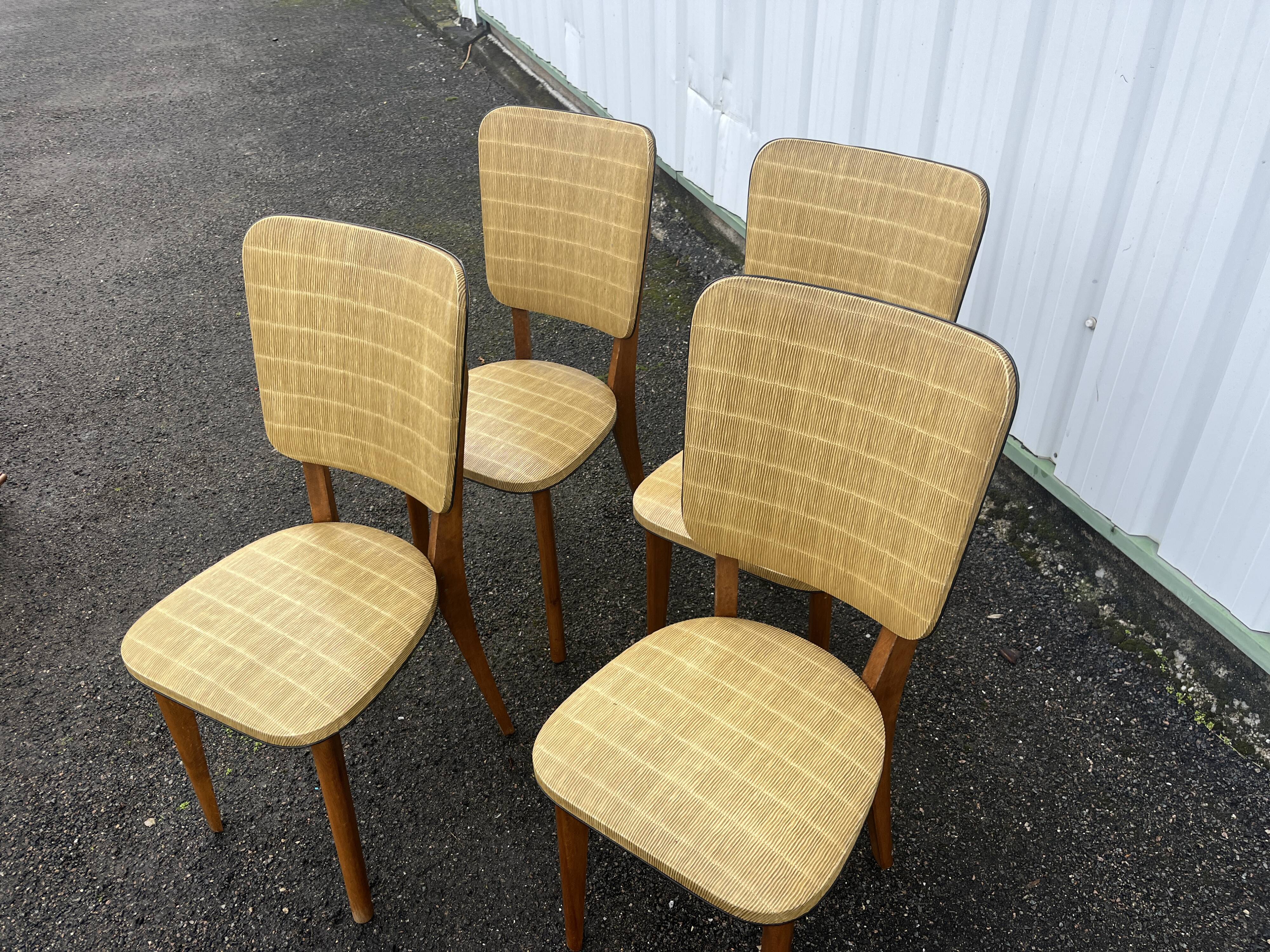Set of 4 vintage chairs from the 50s and 60s in Scandinavian style.