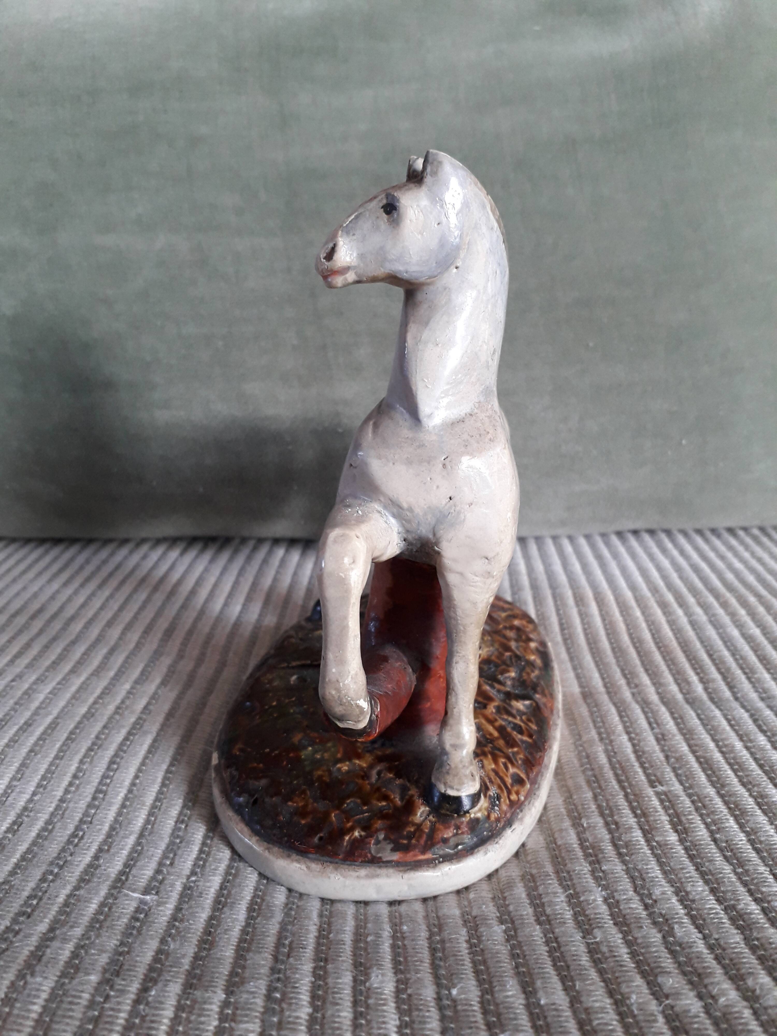 Vintage ceramic horse dating from 1933