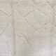 Tapis artisanal en laine naturelle