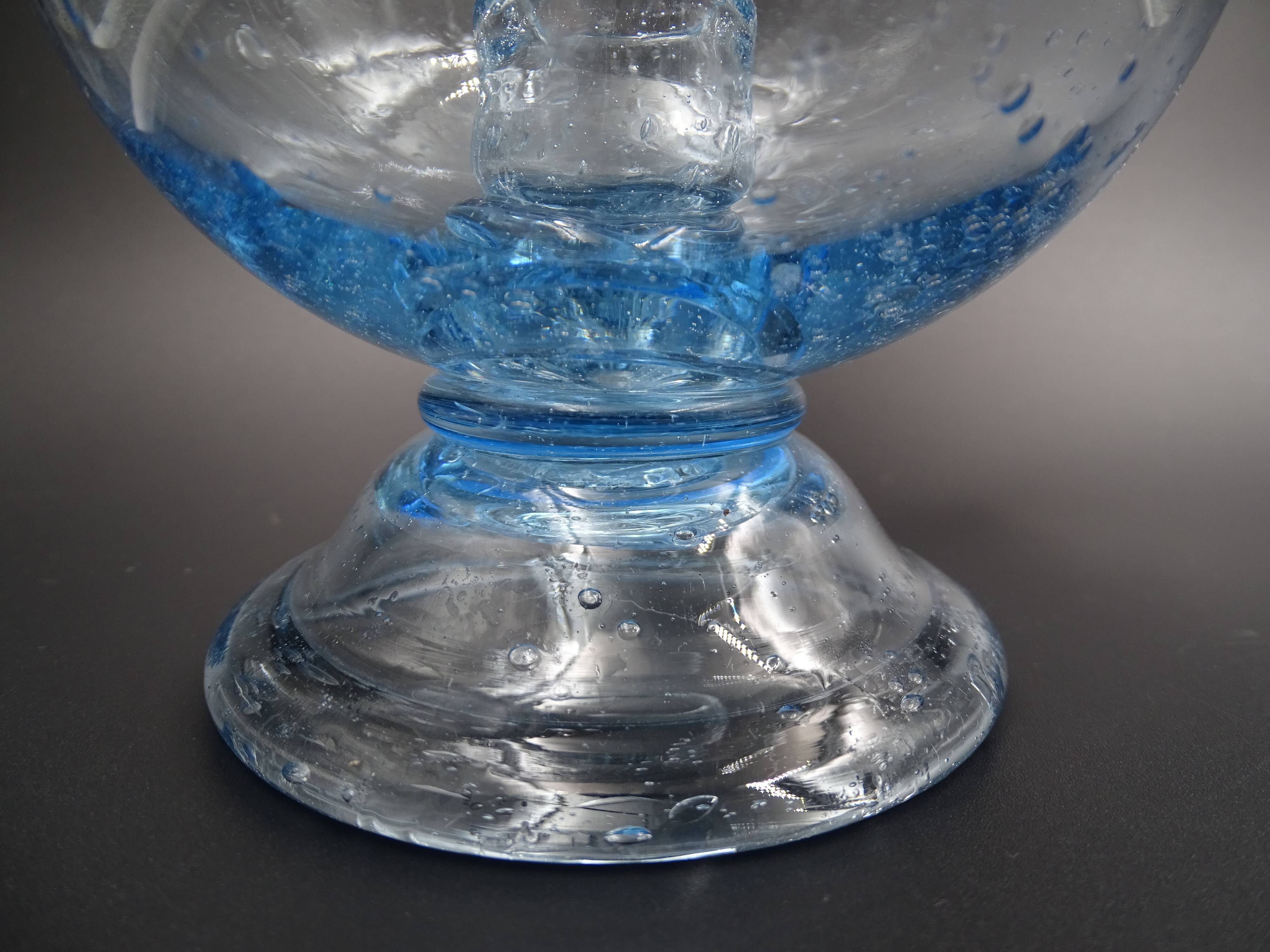 Candlestick or photophore in sky blue bulled glass, signed Biot