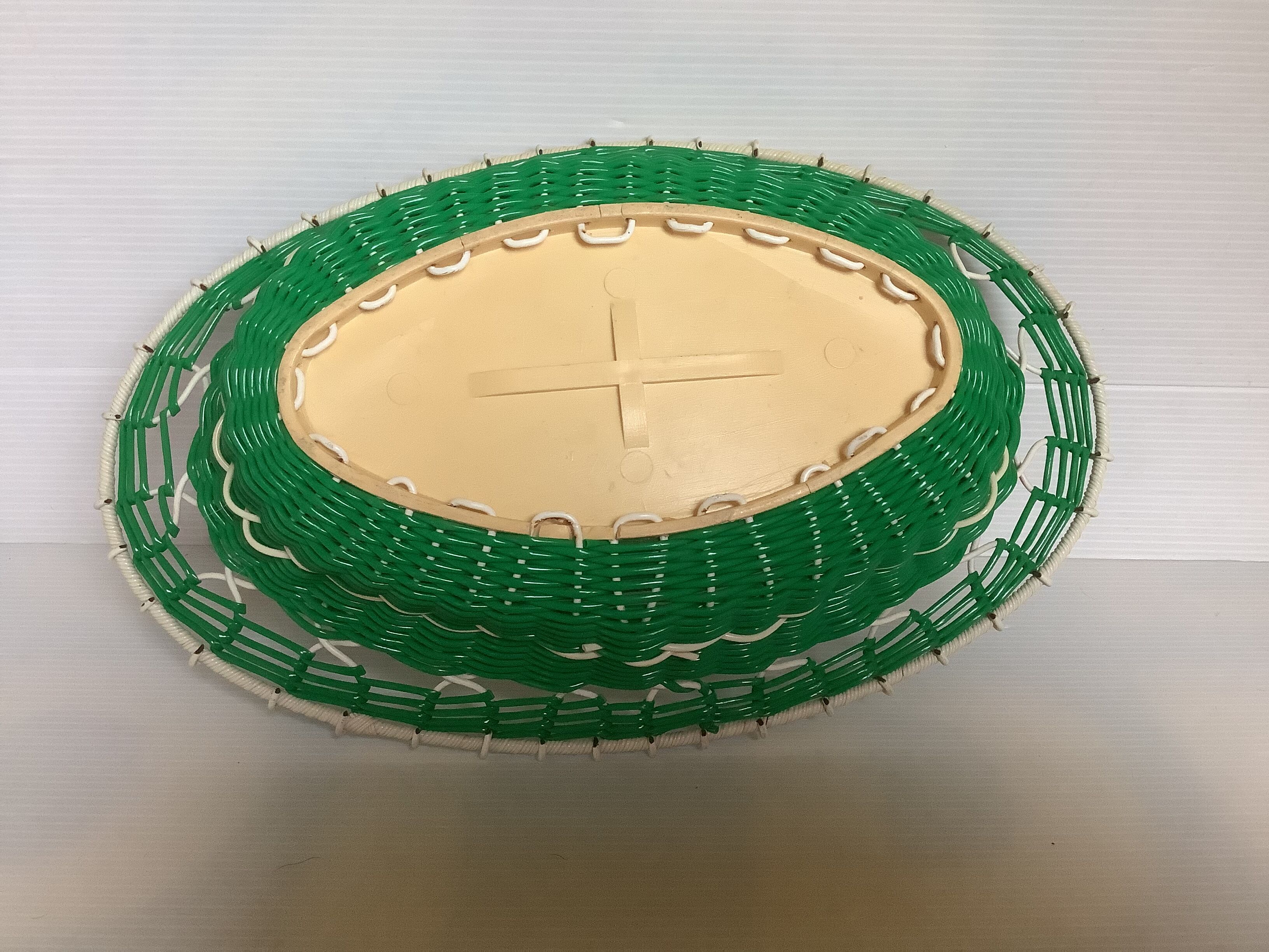 Old green scoubidou basket