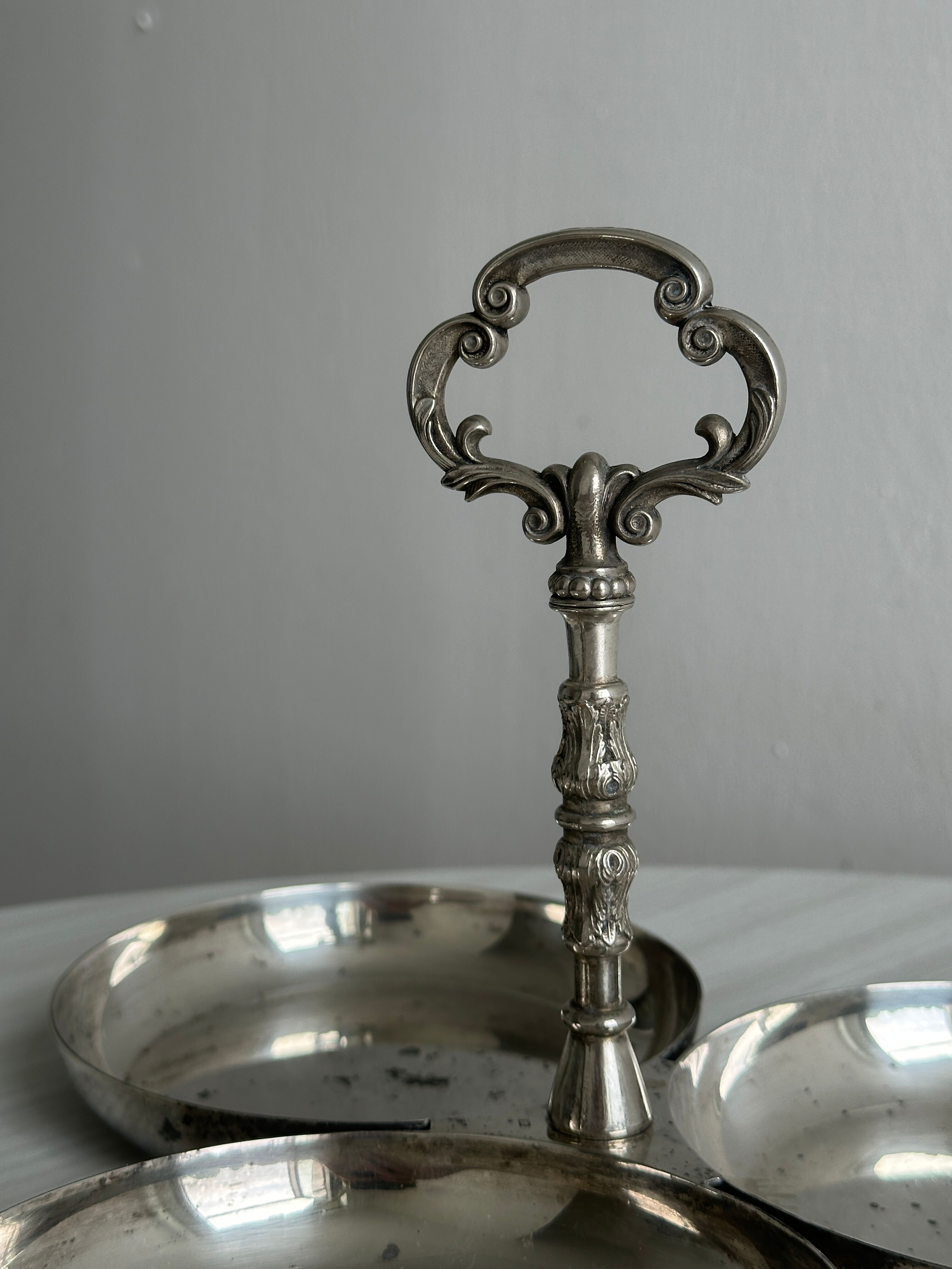 antique tripartite dish with carved handle