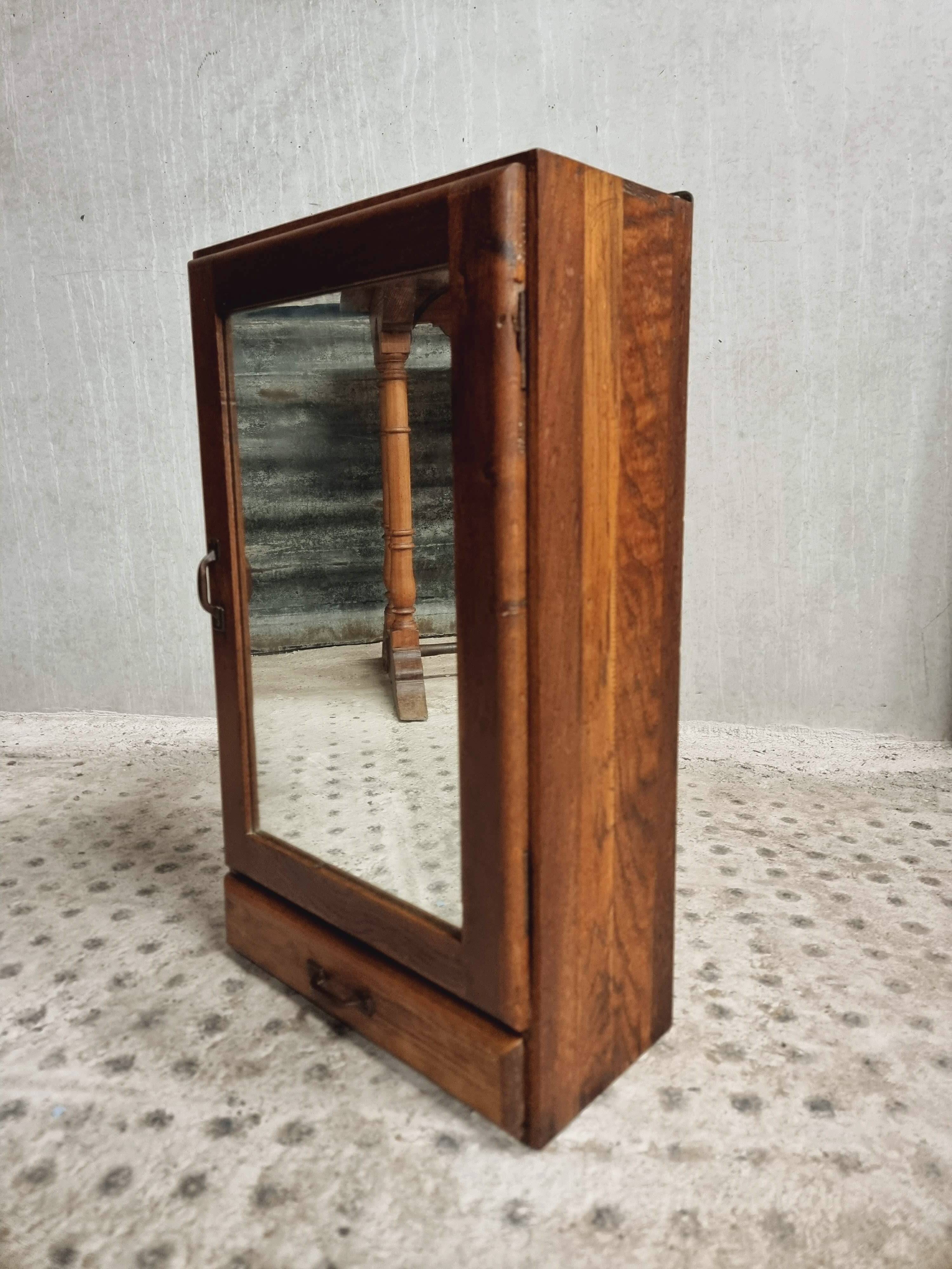 Old hanging cupboard medicine cabinet with mirror and drawer